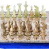 Шахматы каменные "Триада" оникс и ракушечник 40 купить в Казани